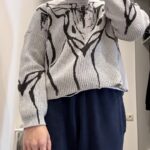 Pull tricoté déchiré